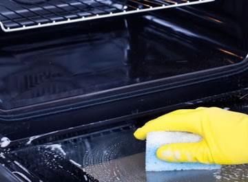 como limpiar un horno muy sucio